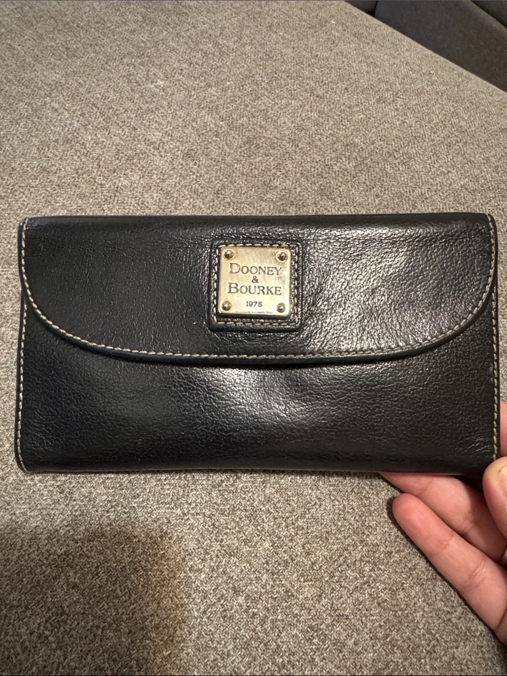 Dooney & Bourke Black Leather Flap Continental Wallet with Gold Plaque